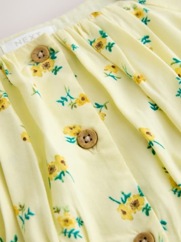 Next Mekko värissä keltainen