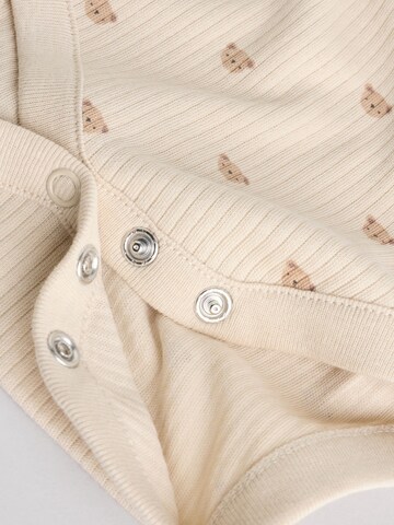 Next - Pijama entero/body en beige