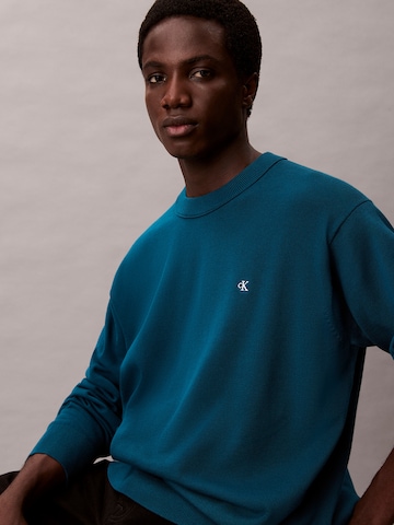 Pull-over Calvin Klein Jeans en vert