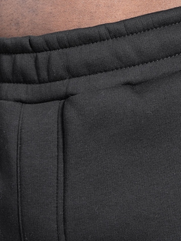 Effilé Pantalon 'Kane' Smilodox en noir