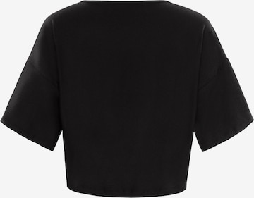 T-shirt fonctionnel 'DT109LS' Winshape en noir