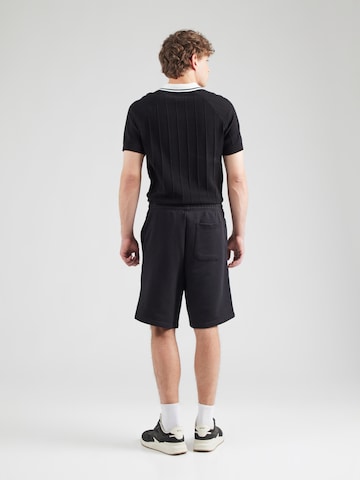 Loosefit Pantaloni 'Nomario' di HUGO in nero