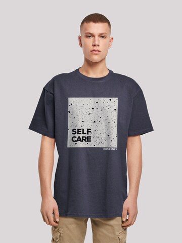 T-Shirt 'Self Care' F4NT4STIC en bleu : devant