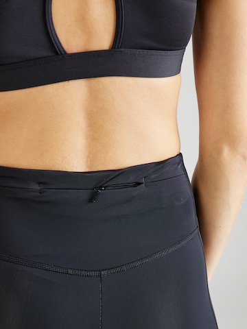 MIZUNO Skinny Sports trousers 'Impulse Core' in Black