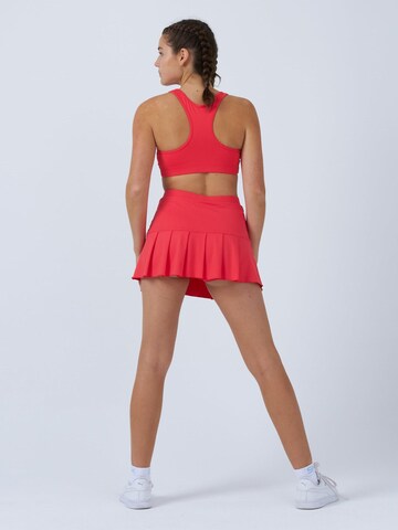 SPORTKIND Sportrock 'Pleated Skirt'‌‌ in Orange