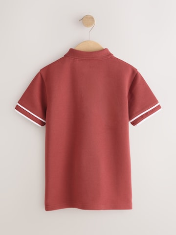 Next - Camiseta en rojo