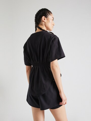 ADIDAS BY STELLA MCCARTNEY Sportshirt 'Curfed Hem' in Schwarz