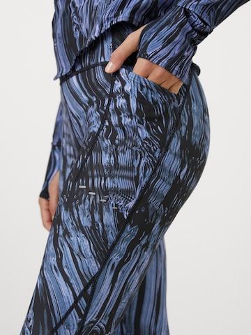 NIKE Skinny Παντελόνι φόρμας 'SWIFT' σε μπλε