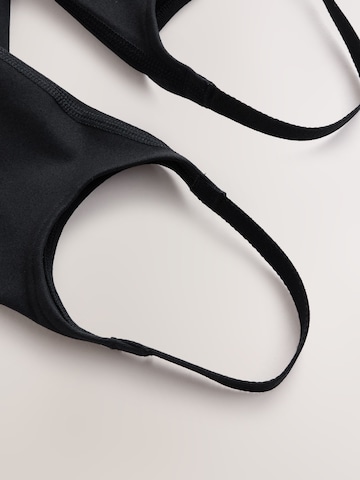 Skinny Leggings di Next in nero