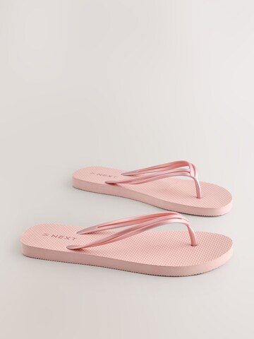 Tongs Next en or