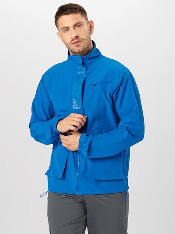 Coupe regular Veste de sport PUMA en bleu : devant