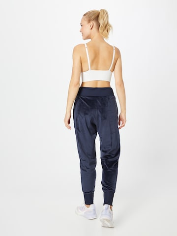 ADIDAS SPORTSWEAR Tapered Workout Pants 'Holidayz Cozy Velour' in Blue