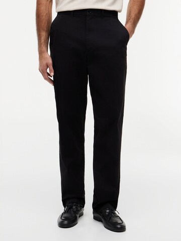 TOMMY HILFIGER Regular Chino trousers 'Dover' in Black: front