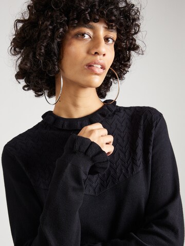 Cream Sweater in Black