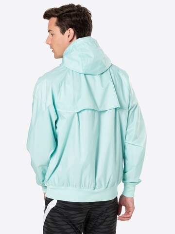 Nike Sportswear Prehodna jakna | zelena barva