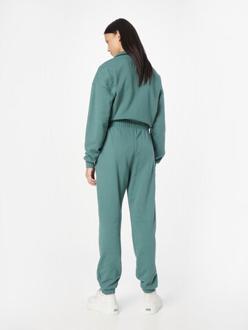 Athlecia Tapered Sportbroek 'Cinzia' in Groen