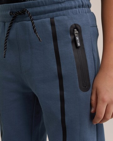 WE Fashion Tapered Broek in Blauw