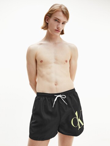 Calvin Klein Swimwear Board Shorts in Black: front