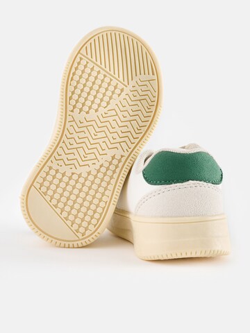 Baskets Next en blanc