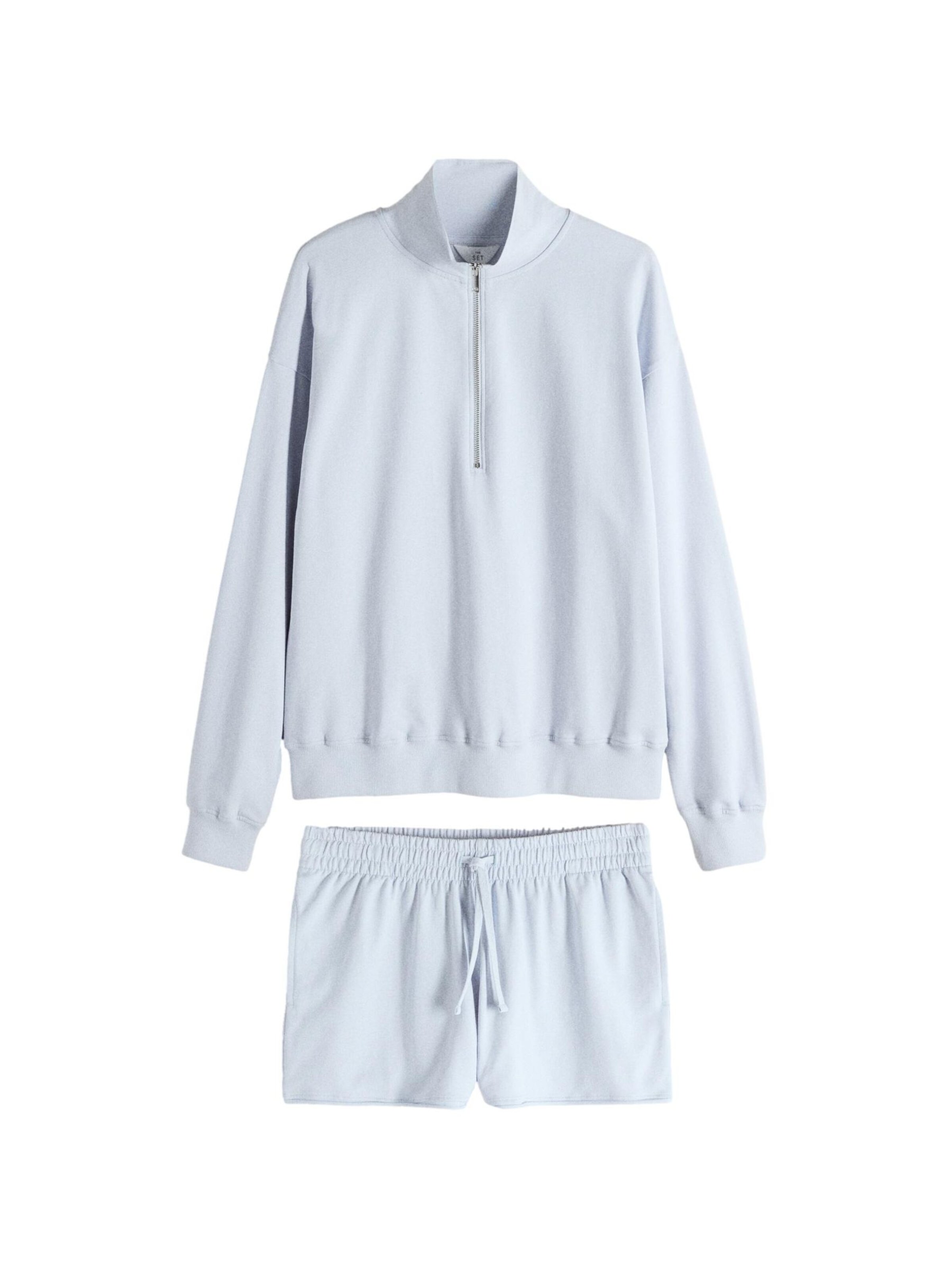 The Set Joggingpak in Blauw: voorkant