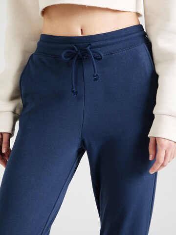 Tapered Pantaloni di Marks & Spencer in blu