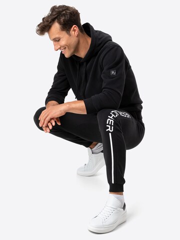 Effilé Pantalon 'Kevin' Herrlicher en noir