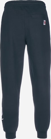 Karl Kani Tapered Jogginghose 'Signature' in Blau