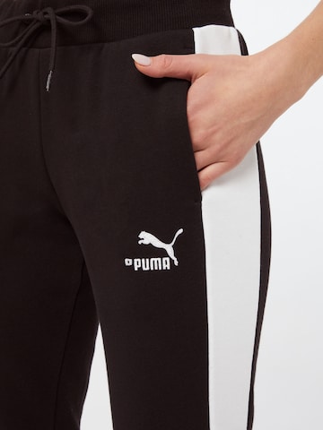 PUMA Tapered Sportbroek 'Iconic T7' in Zwart