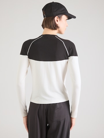 T-shirt fonctionnel HRMN8 en noir