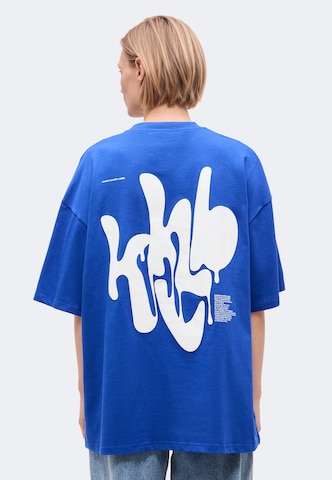 Karo Kauer T-Shirt in Blau: Vorderseite