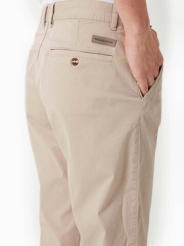 Organication Slimfit Hose in Beige