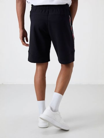 Regular Pantalon Tommy Life en noir