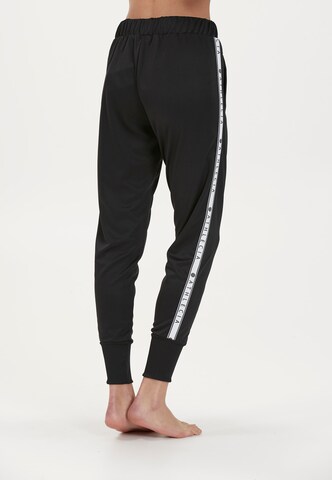 Athlecia Tapered Sweathose 'Sella' in Schwarz