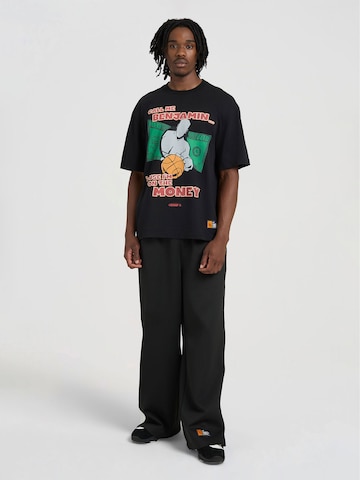 AND1 T-shirt 'Auf Dem Geld' i svart