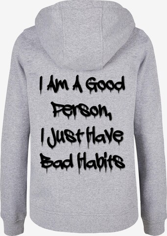 Sweat-shirt 'Bad Habits' Merchcode en gris