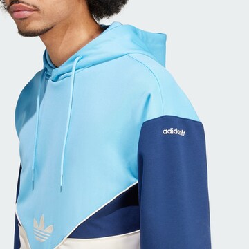 Sweat-shirt 'Cutline' ADIDAS ORIGINALS en bleu