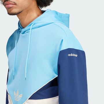 ADIDAS ORIGINALS Sweatshirt 'Cutline' i blå
