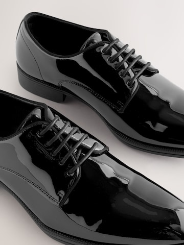 Next - Zapatos con cordón en negro