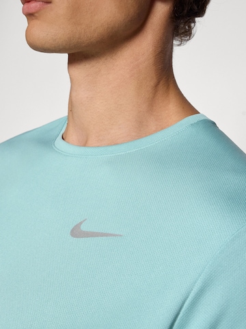 NIKE Sportshirt 'MILER' in Grün
