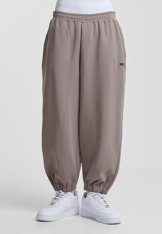 K1X Tapered Pants in Brown: front