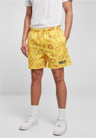 Karl Kani Loose fit Pants in Yellow: front