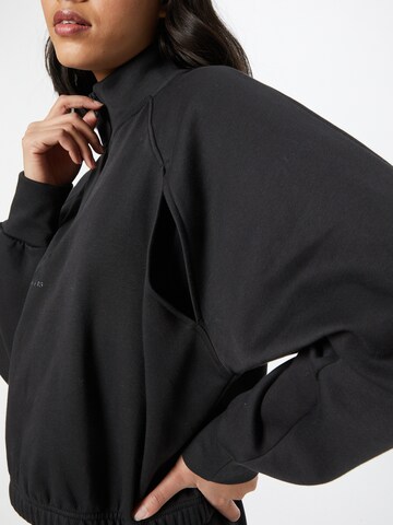 ADIDAS SPORTSWEAR Sports sweatshirt 'Hyperglam Fleece' in Black