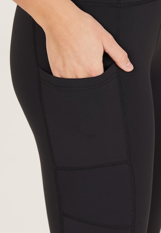 Athlecia Skinny Workout Pants 'Elli' in Black