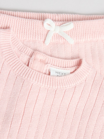 Set Next en rose