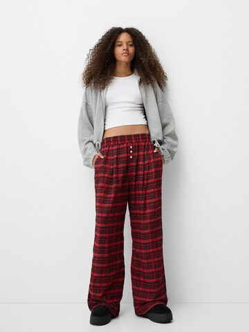 Bershka Loose fit Pleat-front trousers in Red