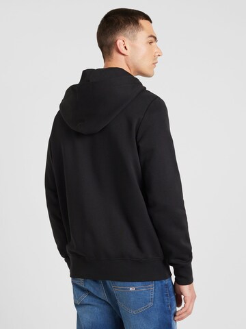 TOMMY HILFIGER - Sudadera con cremallera en negro