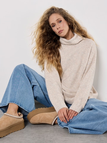 Pull-over ' ' Apricot en beige