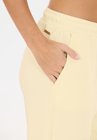 Athlecia Tapered Sweatpants 'Jacey' in Gelb
