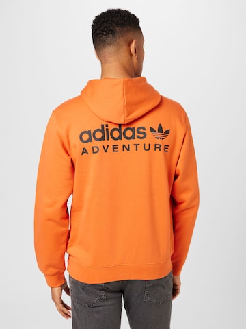 ADIDAS ORIGINALS Sweatshirt 'Adventure' in Orange