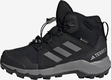 ADIDAS TERREX Boots in Black: front